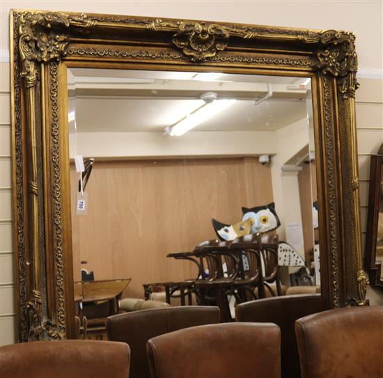 A large Victorian-style wall mirror 214 x 124cm
